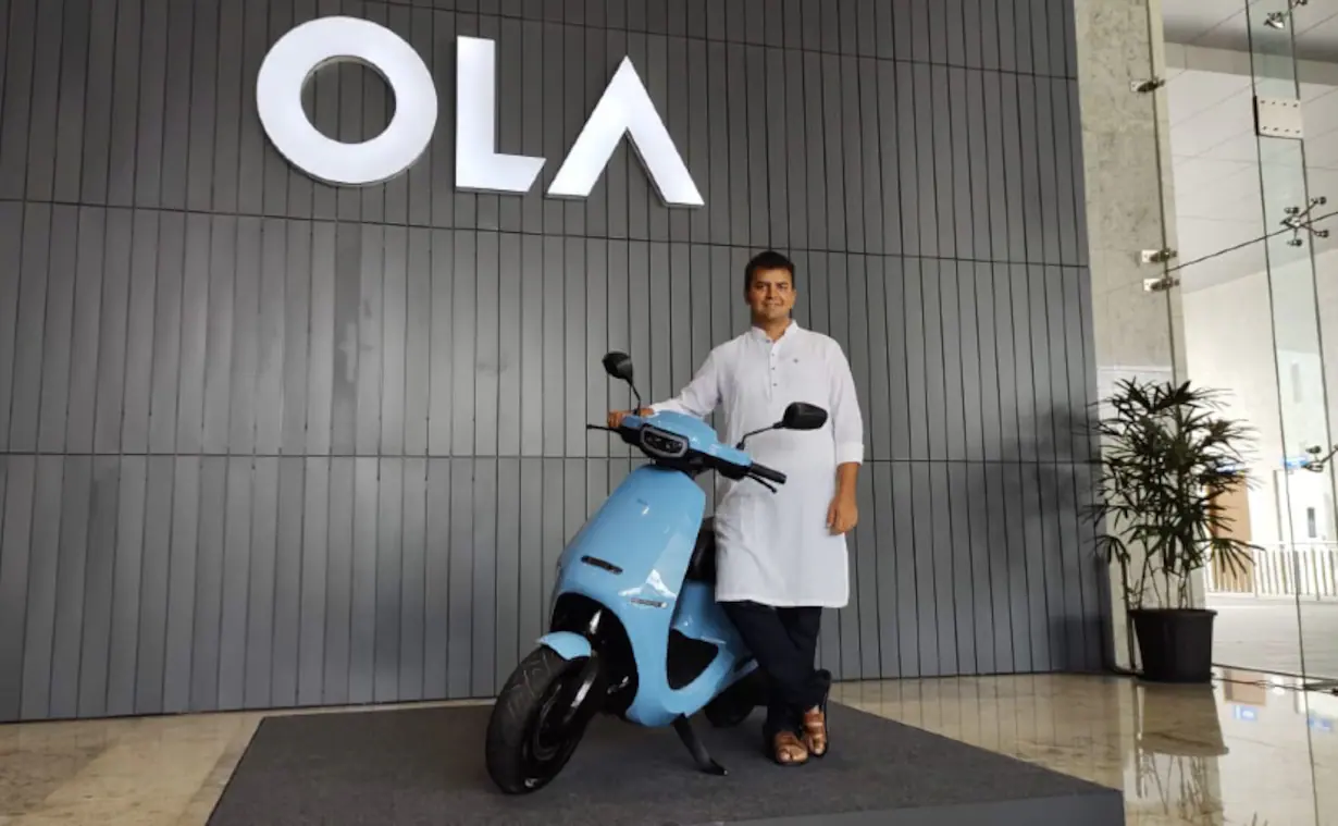 Ola Electric bike parked, showcasing its sleek design and branding, symbolizing India's push towards sustainable transportation.