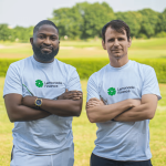 Founders of LemFi, Ridwan Olalere and Rian Cochran, wearing lemonade-themed top, symbolizing their company's branding.