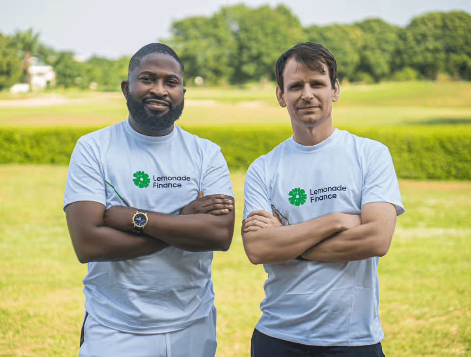Founders of LemFi, Ridwan Olalere and Rian Cochran, wearing lemonade-themed top, symbolizing their company's branding.